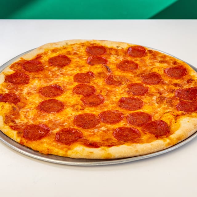 Three Toppings Pizza Slice.